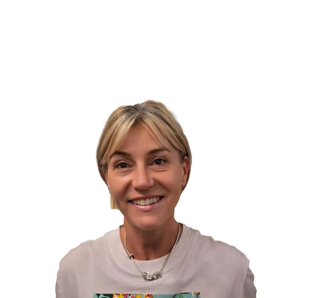 Headshot of a woman smiling at the camera.