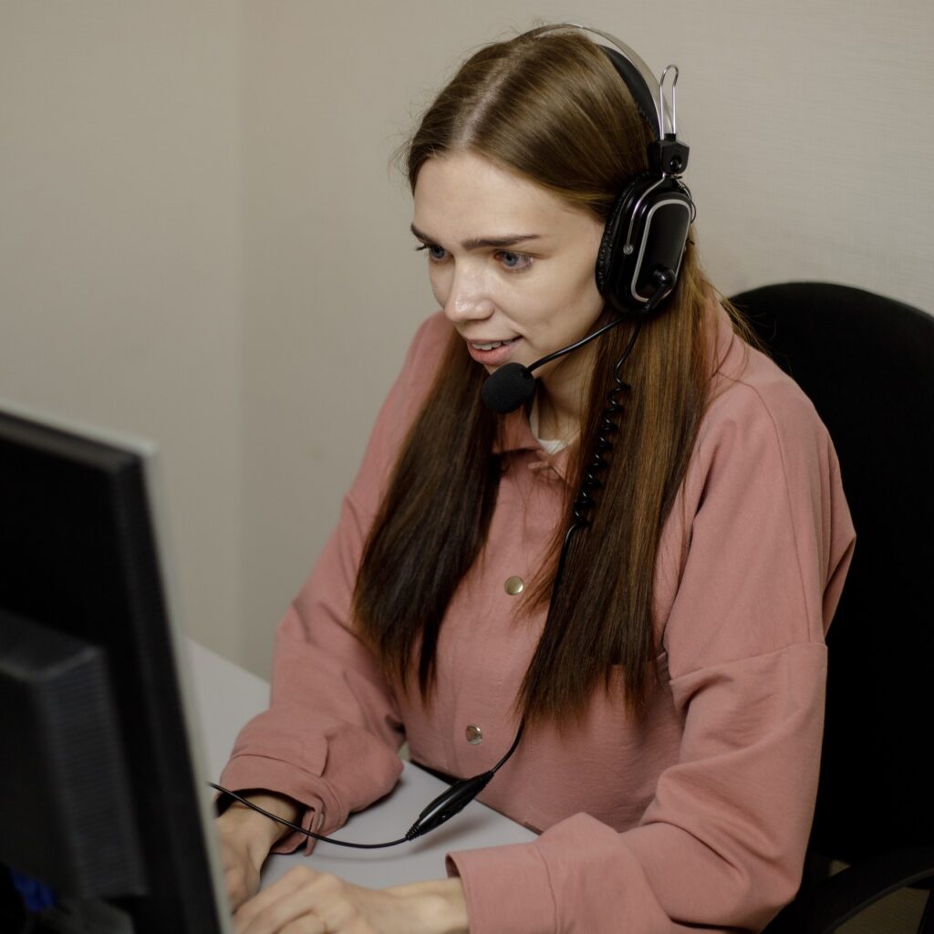 A digital support professional speaks to a user via video call